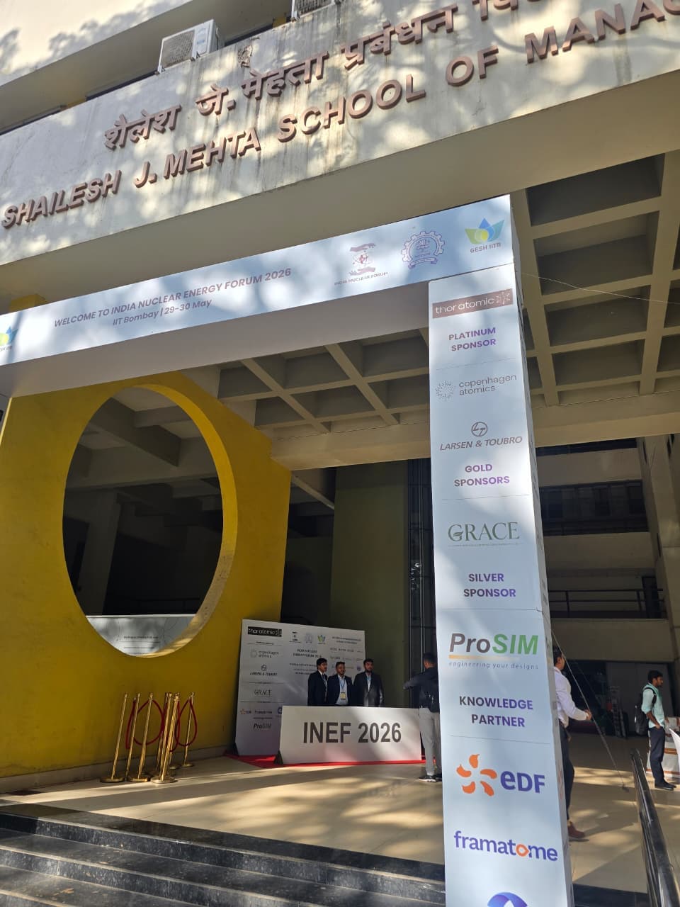 Entrance to the India Nuclear Energy Forum 2026 at the Shailesh J. Mehta School of Management, IIT Bombay, with GRACE shown on the sponsor board.